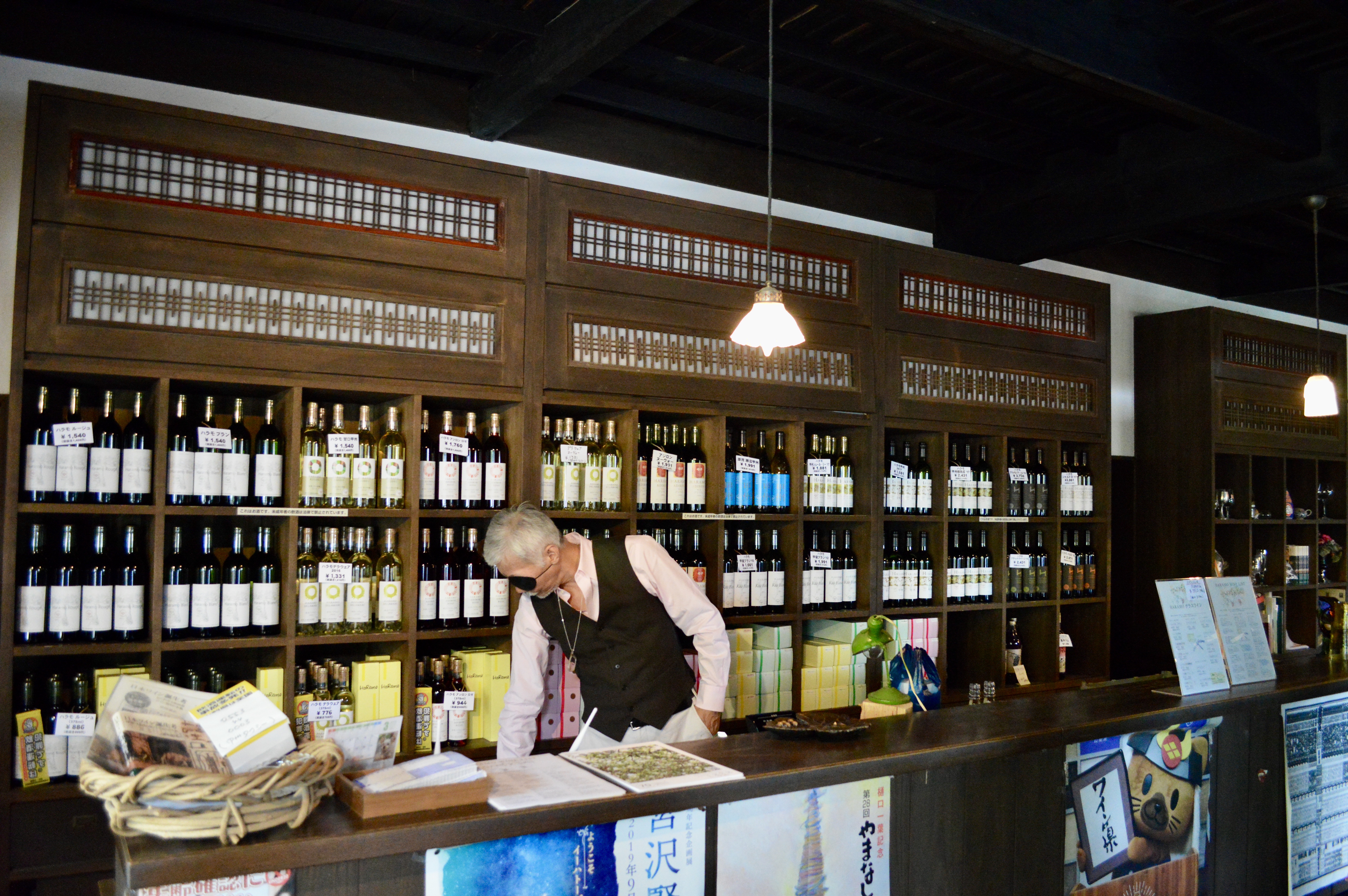 Here is the owner of Haramo Winery behind the tasting counter.