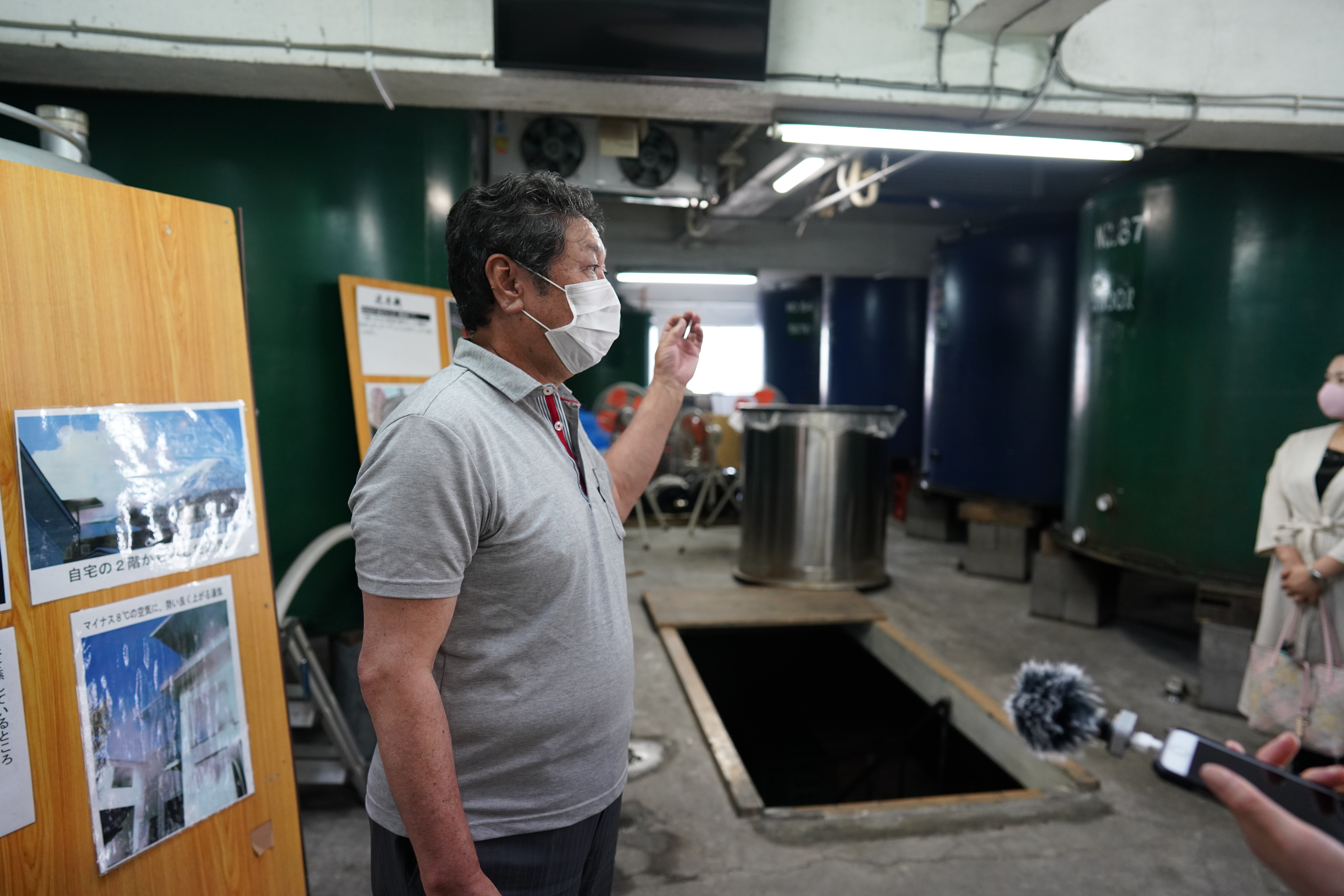 This photo of the sake brewery's owner, Mr. Ide, is a testament to Japan's strict adherence to COVID-19 protocol.